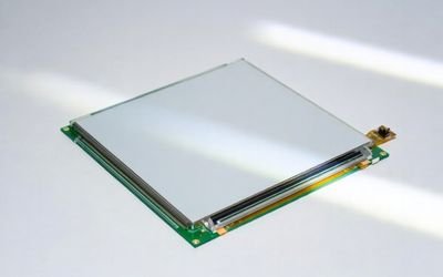 Square LCD module with industrial-grade display design on a clean white background.