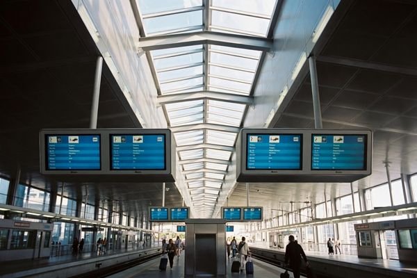 HB185X high brightness LCD module used as railway and metro station information display in a bright station hall