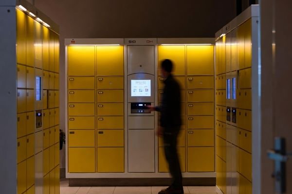 Square lcd display module used as parcel locker pickup screen in an apartment lobby