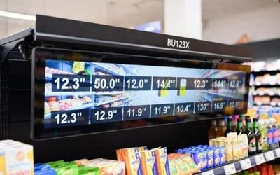 BU123X ultra-wide bar display used as a retail shelf digital signage showing pricing and product labels