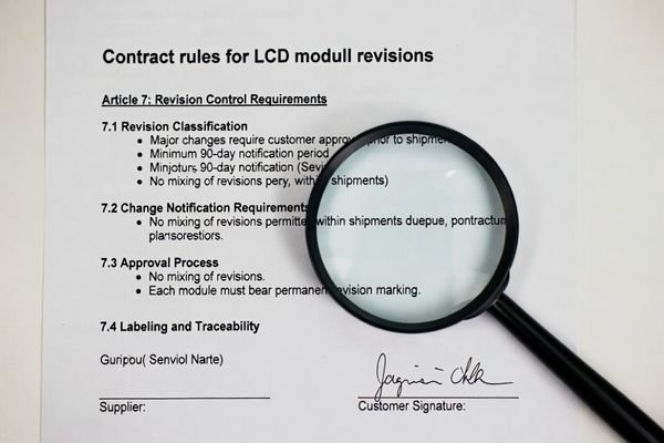 Example of a contract clause defining revision triggers for an LCD module
