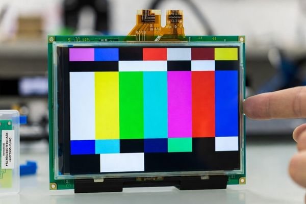 An LCD module showing a shifted image with a black bar on one side
