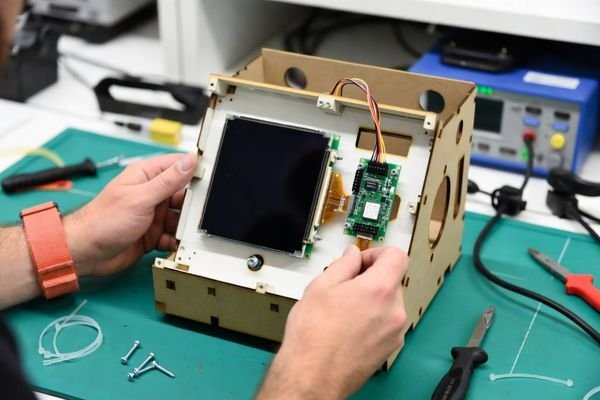 An engineer quickly integrating a standard off-the-shelf LCD module into a simple prototype box